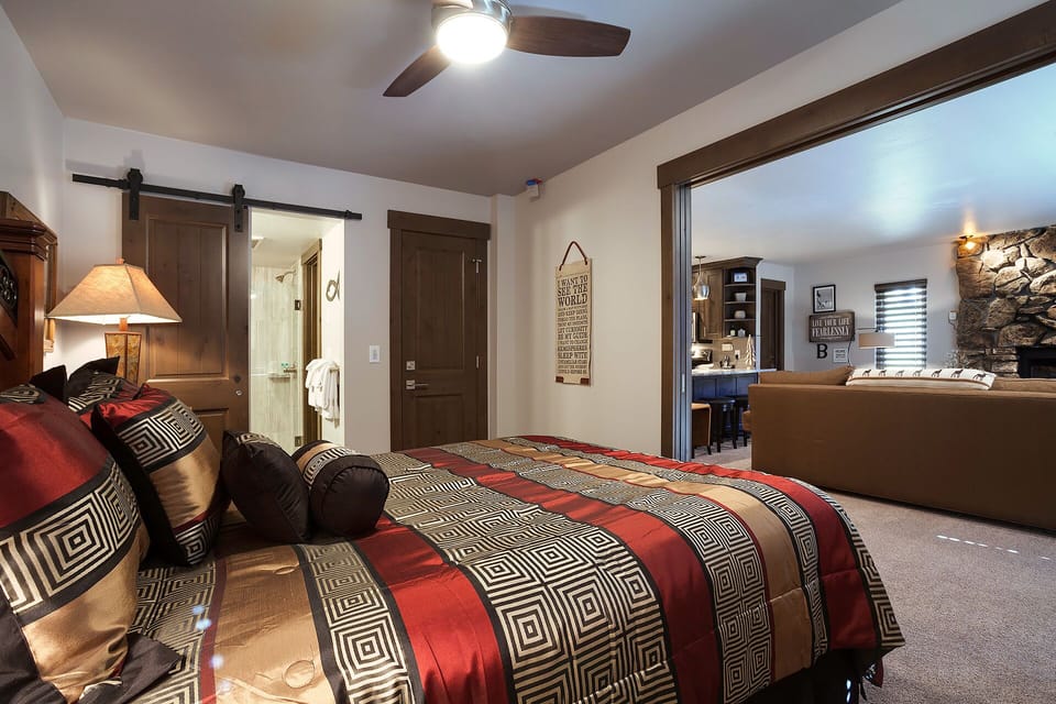 Unwind in your rustic-luxe retreat with warm wood accents, a cozy fireplace, and thoughtful details that create the perfect mountain getaway.