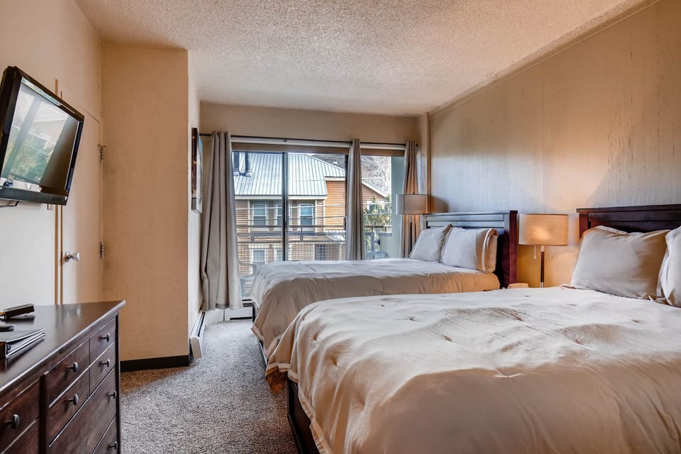 This hotel style condo offers two comfortable queen size beds.