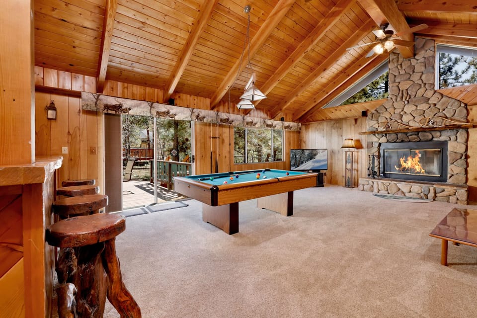 Fun-filled game room with a pool table—perfect for family fun, friendly competition, and unforgettable entertainment during your stay.