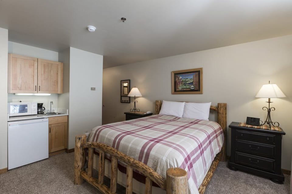 Has a wet bar with microwave, mini refrigerator, and coffeemaker.