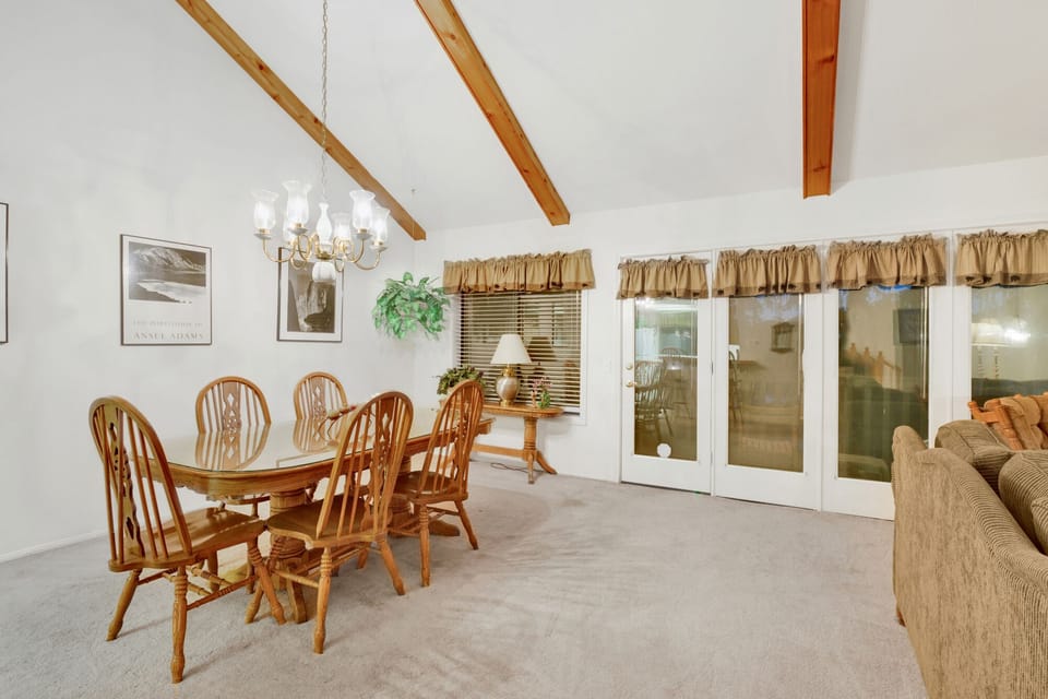 Fully equipped cabin kitchen with ample cabinetry, stove, fridge, microwave, and coffee maker—perfect for cooking meals, morning coffee, and feeling right at home on your stay.