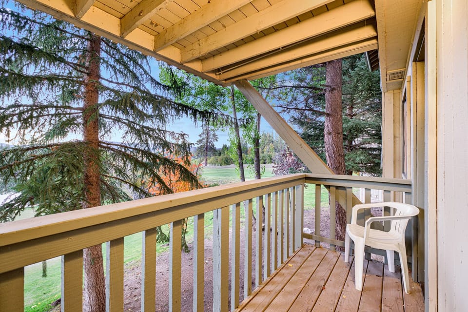 Welcoming cabin entry surrounded by towering pine trees, offering fresh mountain air and a peaceful forest setting—the perfect first impression for your Big Bear Lake getaway.