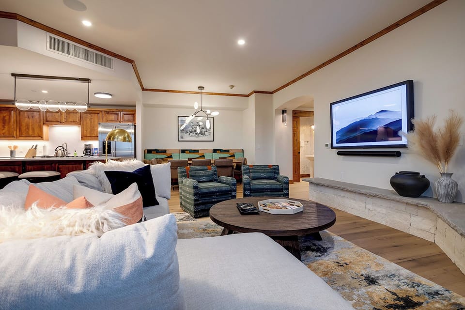 Sink into plush sofas and enjoy movie nights on your 75-inch TV while the open kitchen invites culinary adventures.