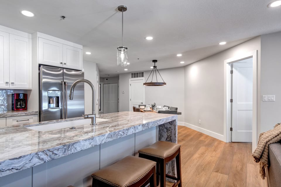 The spacious breakfast bar offers seating for 4 guests.