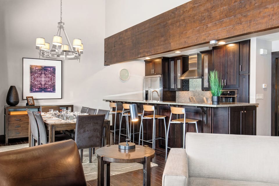 The dining area and open concept kitchen with island.