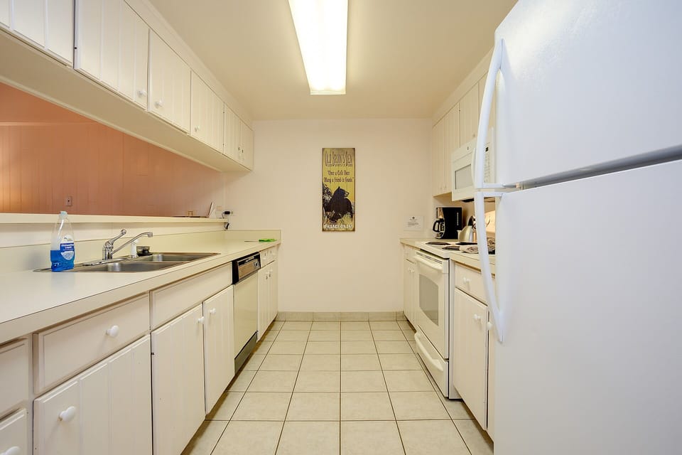 Your fully equipped galley kitchen features everything you need to prepare meals, from morning coffee to home-cooked dinners during your stay.