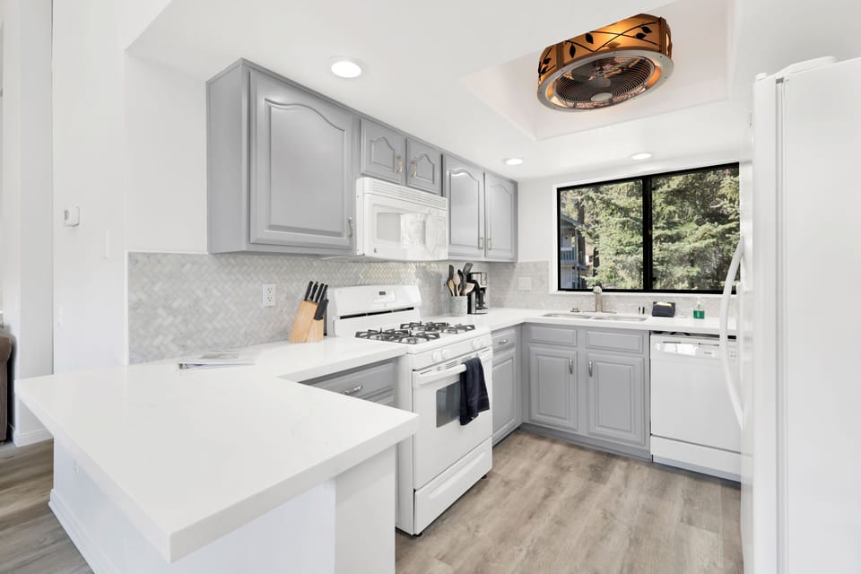 Modern, fully equipped kitchen with updated appliances, ample counter space, and a bright open layout perfect for preparing meals and enjoying time together.
Tags: Kitchen, Fully Equipped Kitchen, Modern Kitchen