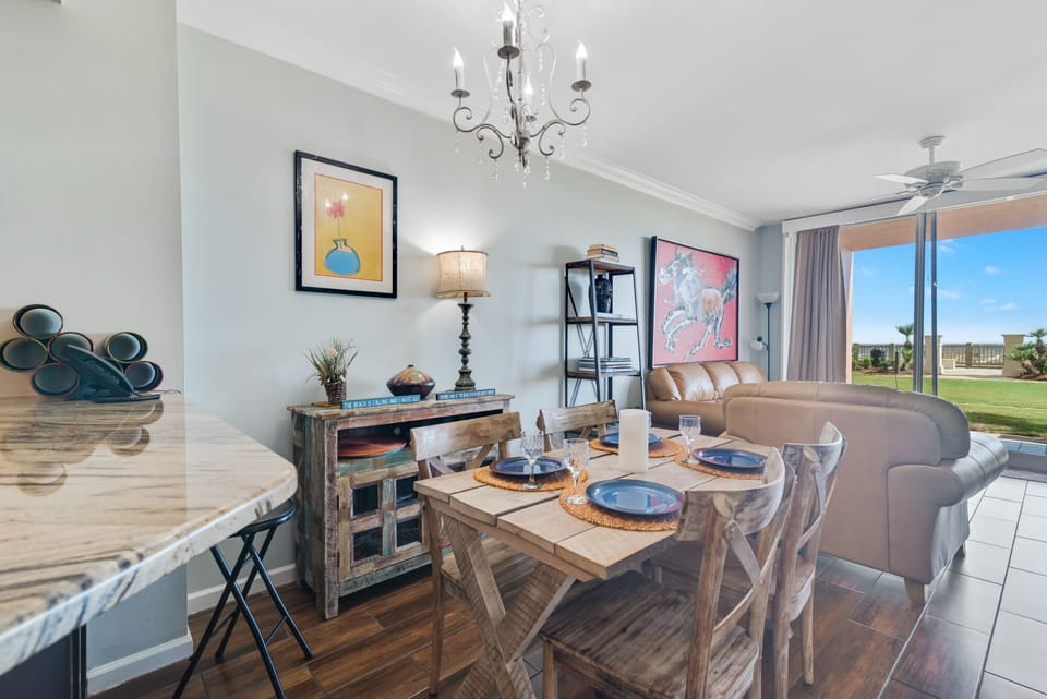 Dine with an ocean vista. This charming dining area offers the ideal setting to savor meals while enjoying breathtaking views of the sparkling coastline.