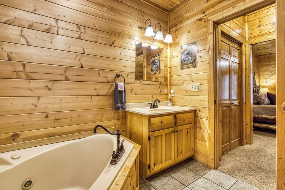 Master Bathroom with Jacuzzi Tub and Full Shower Unit on Main First Floor!