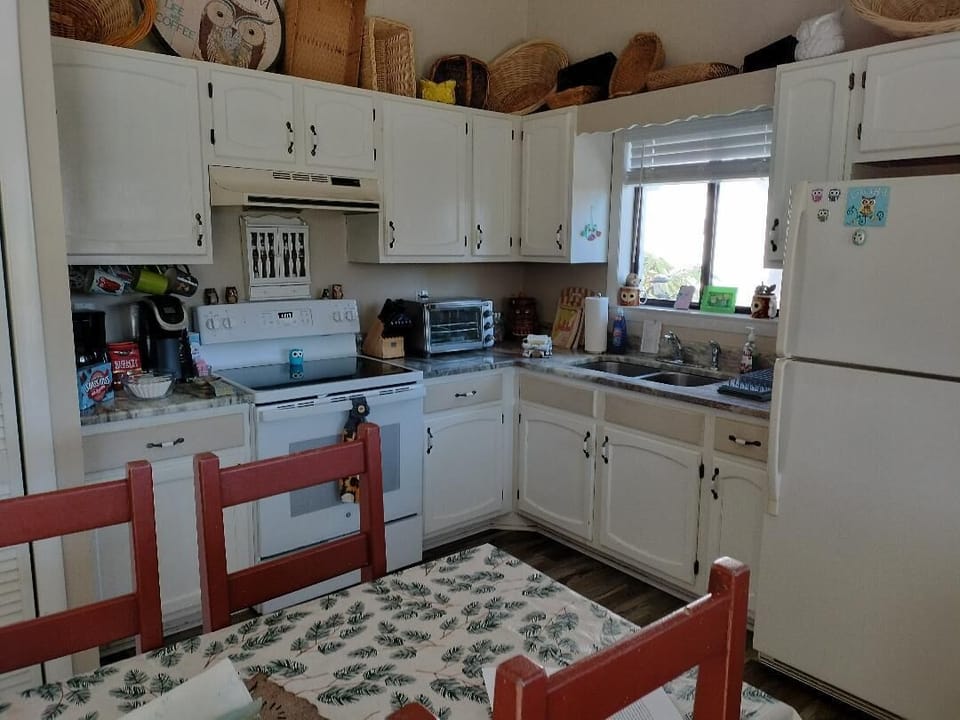 kitchen with granite countertops and new dishwasher