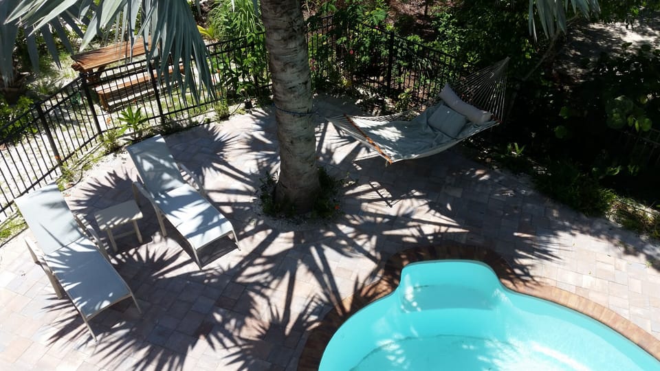Relax in the shade in the  hammock and 2 chaise lounges.
 