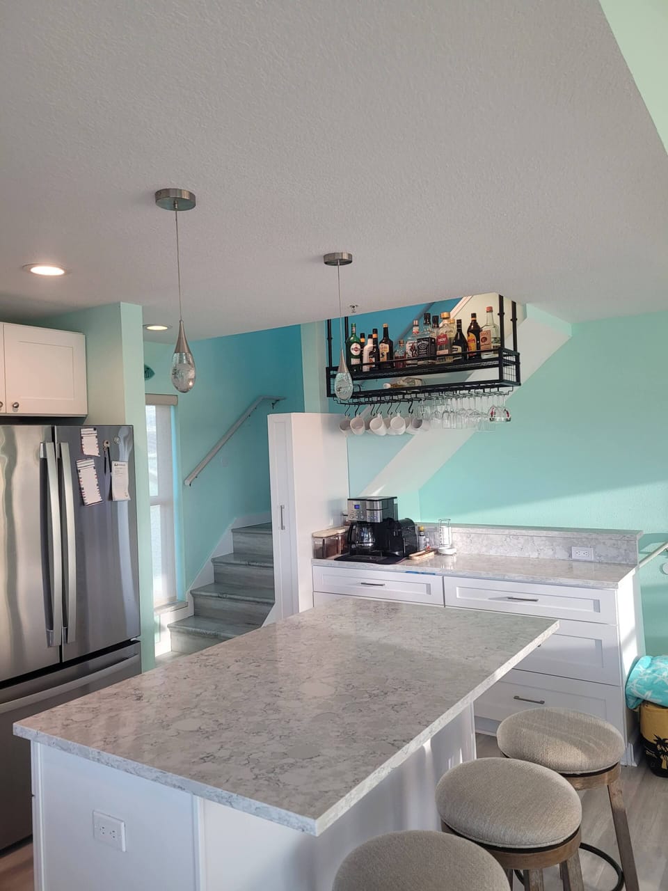 Enjoy an espresso/coffee or glass of wine at our drink bar with lots of storage.