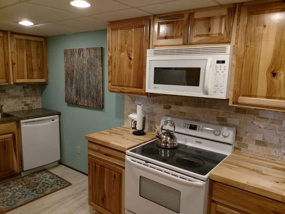 Full Kitchen with Stove, Microwave, Refrigerator, DIshwasher, Sink, Countertops