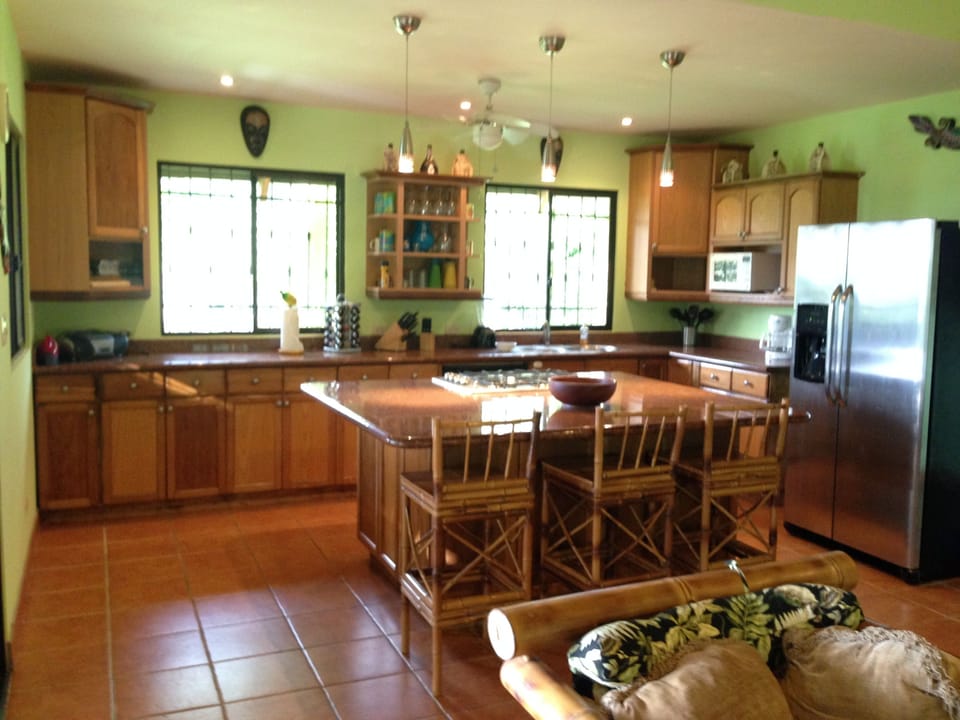 Gourmet Fully-equipped Modern Kitchen with Casual Island Seating