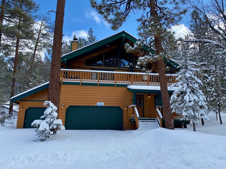Snow covered Big Bear Cool Cabins, Summit Adventure