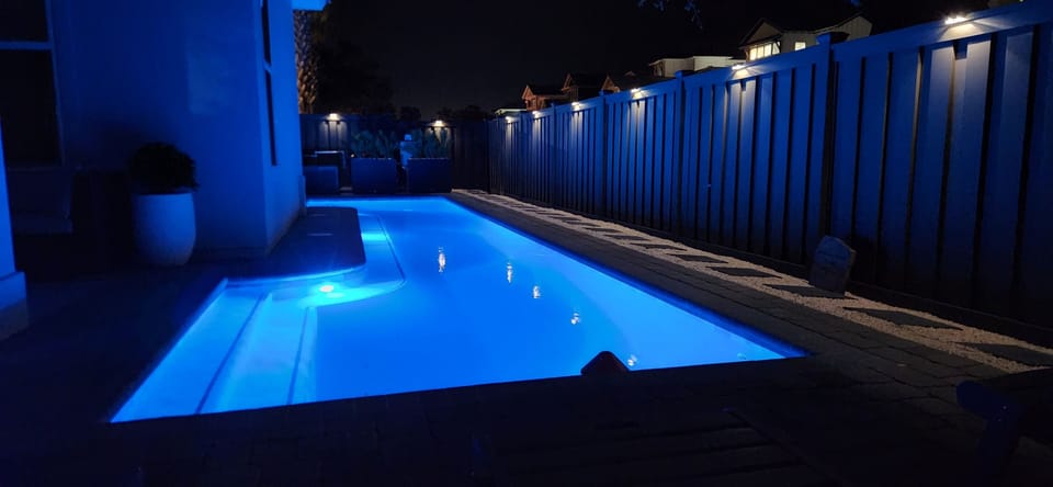 Take a night swim in your private pool