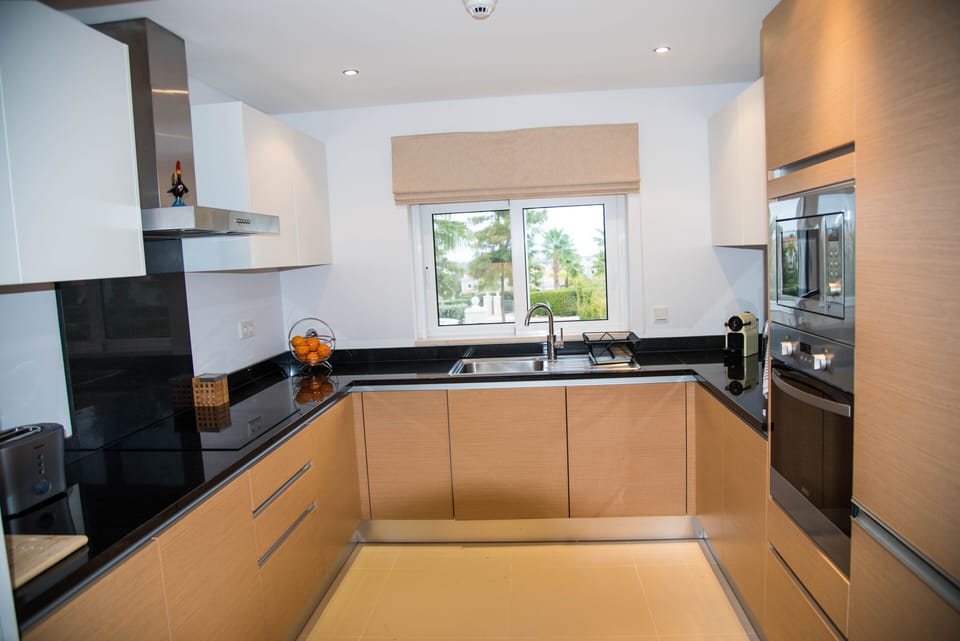 Kitchen with bright street view
