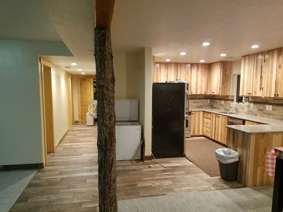 kitchen with  upright freezer, also pull out freezer in fridge. 