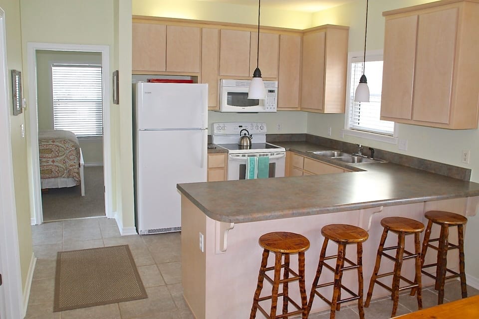 Cooks can work in the well-stocked kitchen and still visit with everyone 