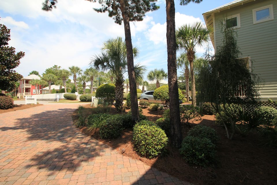 The driveway has plenty of room for parking and the pool is across the street