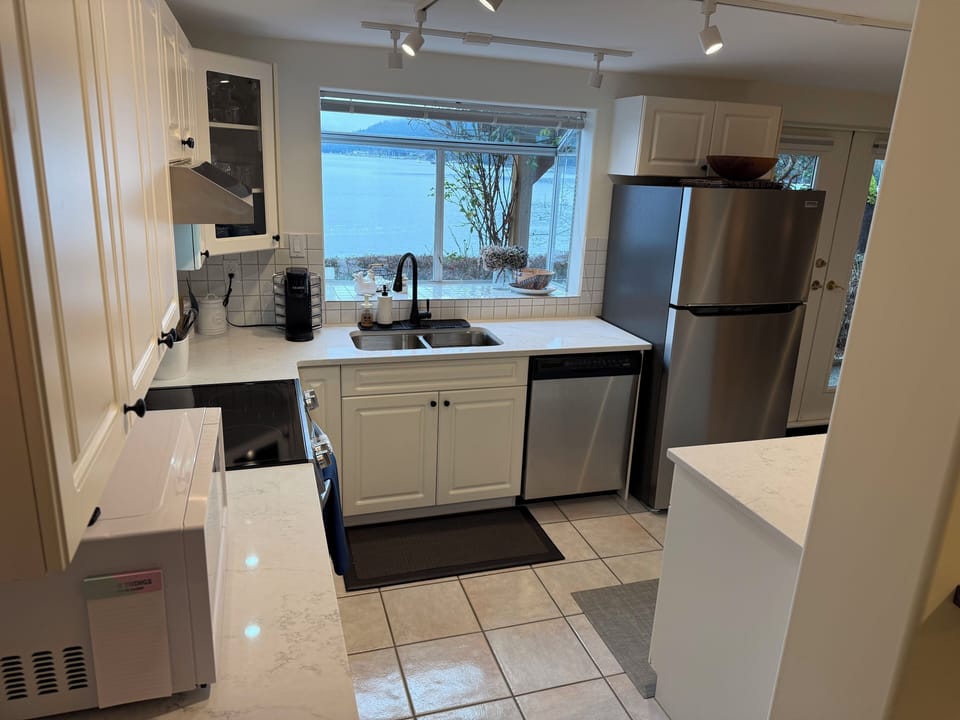 Newly renovated kitchen with views out to the ocean