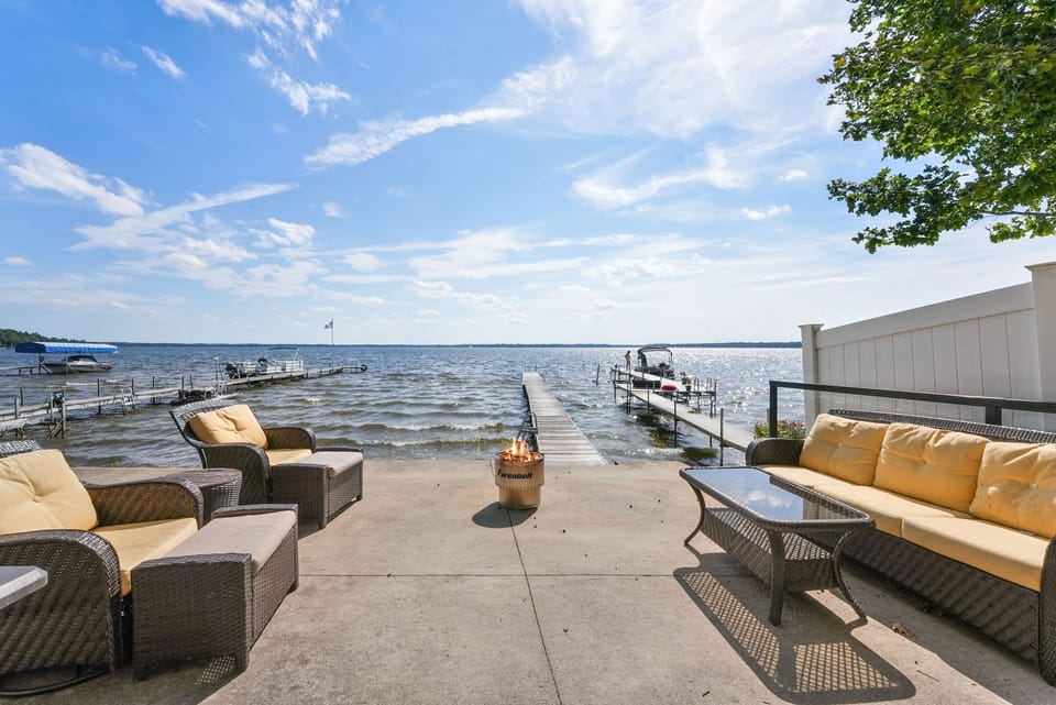 Relax lakeside with our comfortable patio furniture and firepit