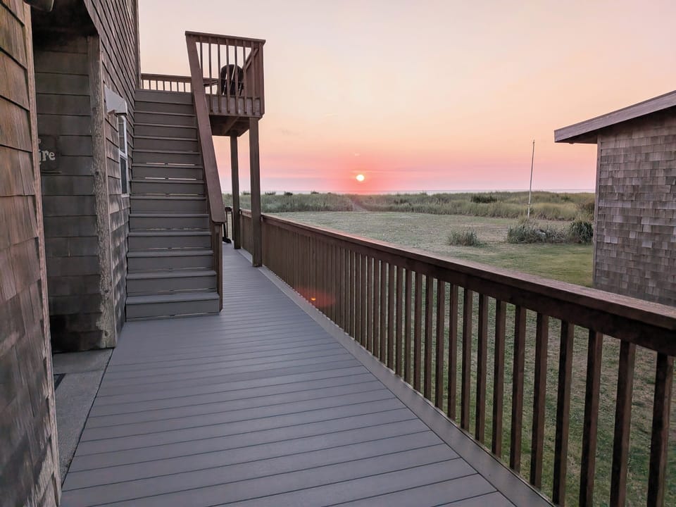Large wrap-around composite deck on main level