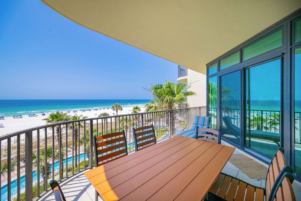 Your balcony invites you to unwind with warm gulf breezes and peaceful beachside views every morning