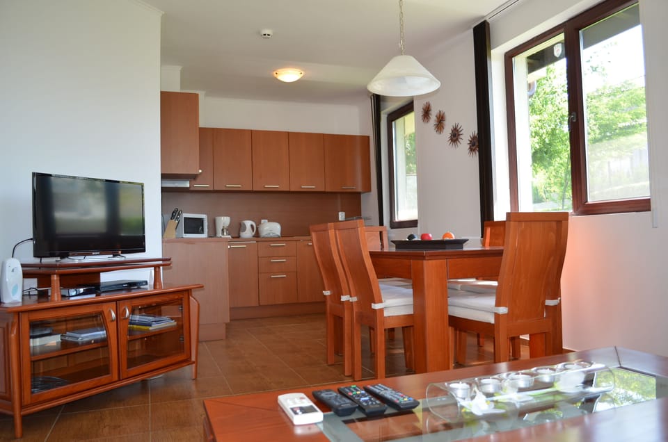 Fully fitted integrated Kitchen and Dining area. An open concept. LED television