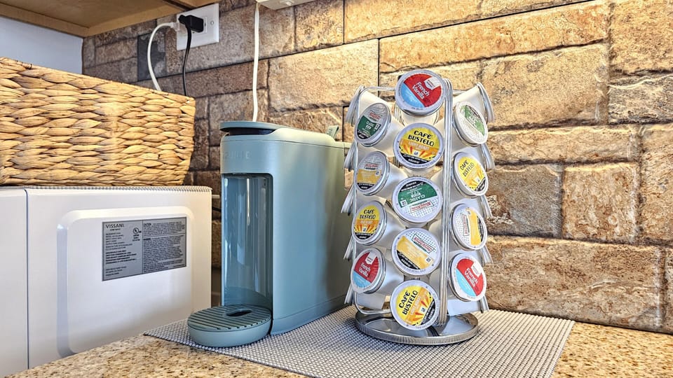 Cozy kitchenette corner with stylish stone backsplash