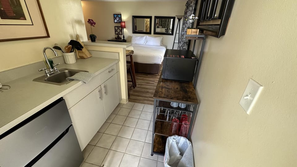 Cozy kitchenette with modern appliances and charming decor