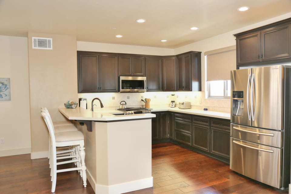 Kitchen with bar seating for 3