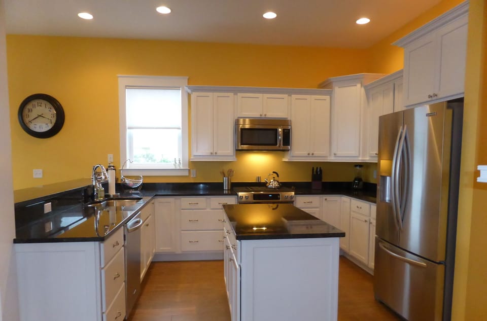Brand new, fully stocked kitchen with stainless steel appliances and island