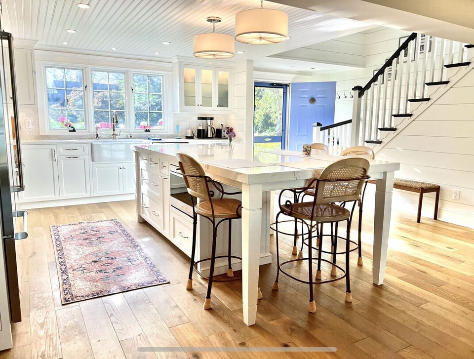 New Chef’s Kitchen, 2022. Cape oak floors run throughout the brightly lit space.