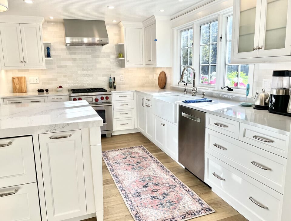 New Wolf bi-fuel gas stove, Bosch dishwasher, touchless faucet and farmer’s sink