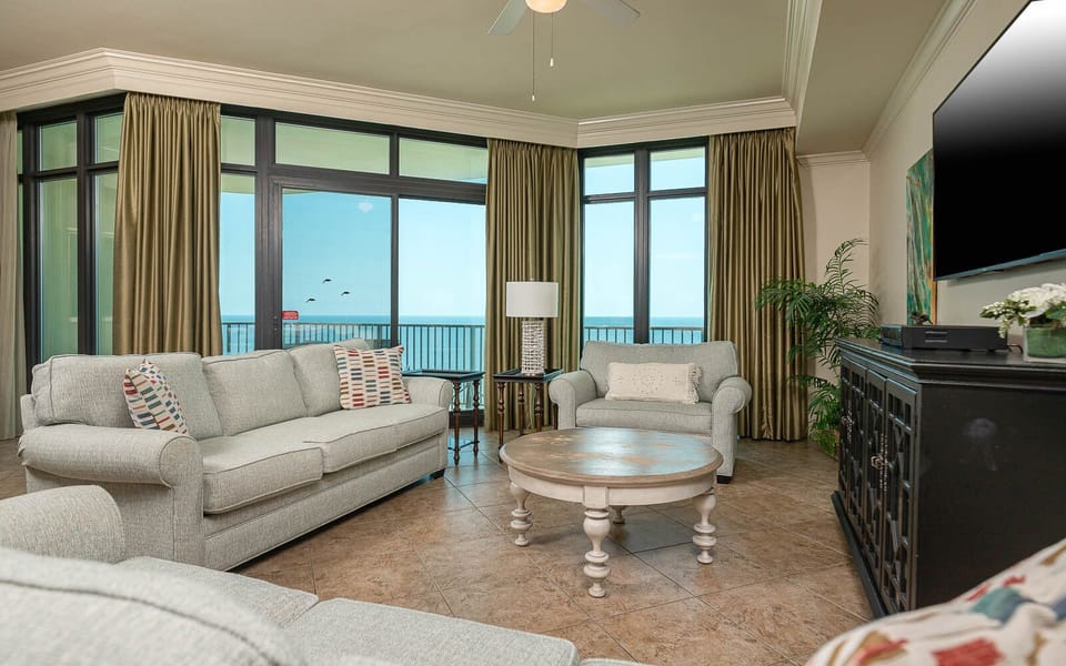 Relax on the plush sofa with a queen sleeper while enjoying the coastal views from the balcony