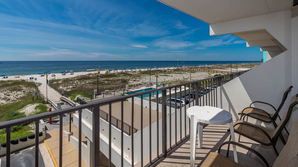 Enjoy breathtaking beachfront views from the balcony, perfect for relaxing or dining outdoors