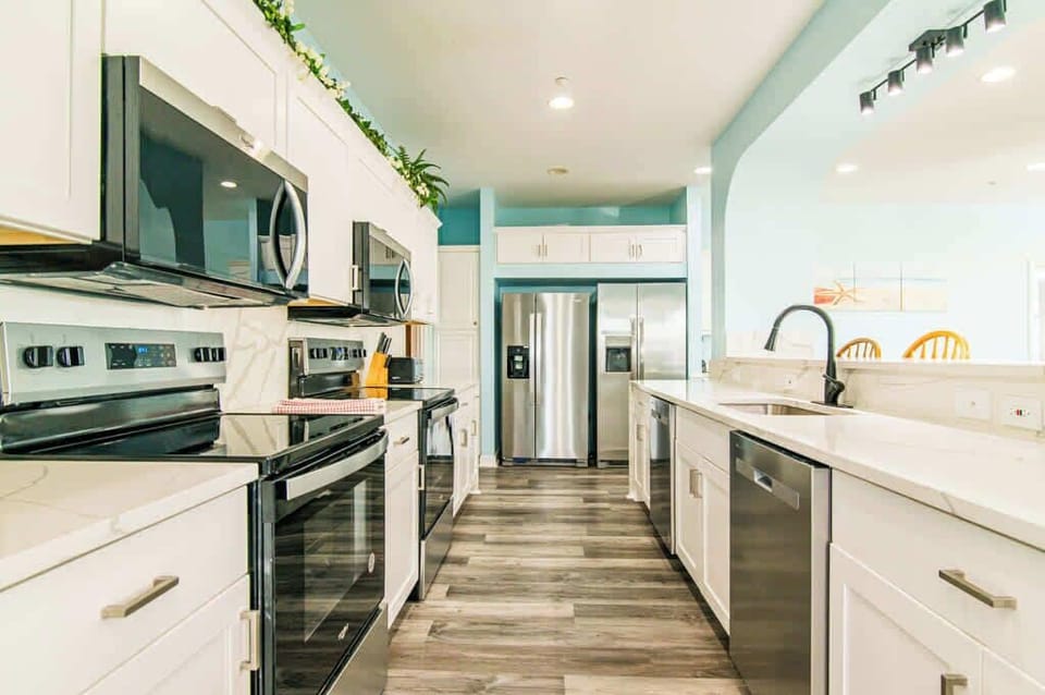 All New Stainless Appliances and Quartz Counters