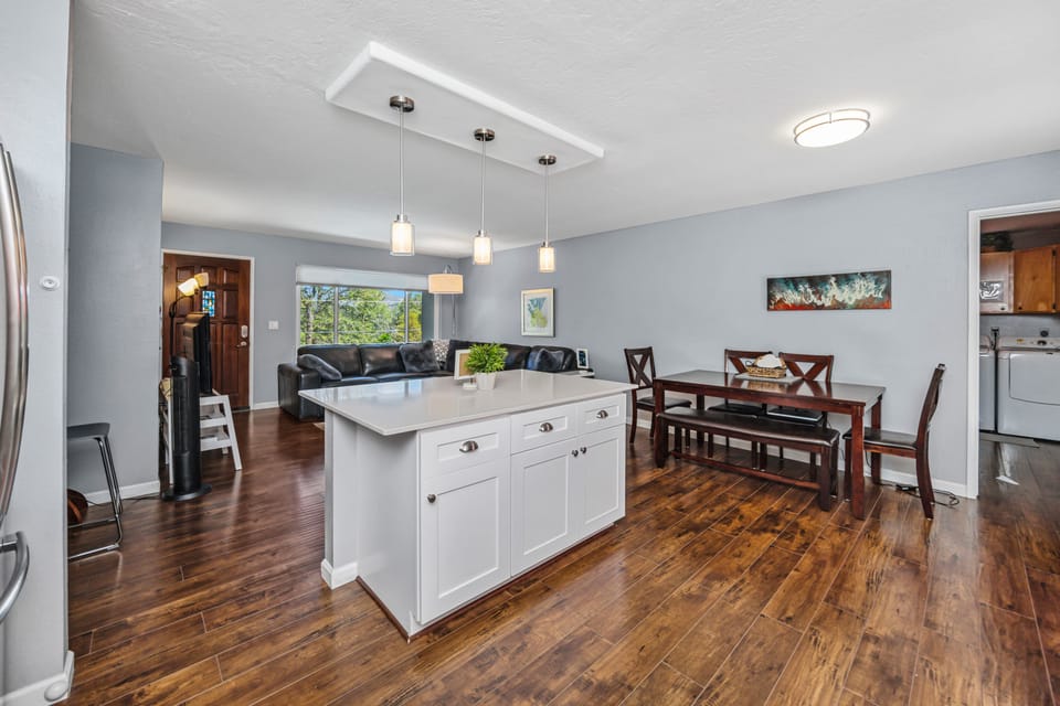 Large quartz island opens to living room and dining room, great place to gather.