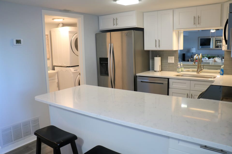Full sized refrigerator with water & ice in the door, very quiet dishwasher