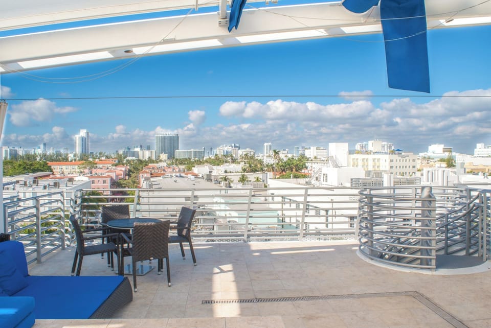 Sky line views from the private rooftop terrace/ hot tub deck and wet bar with sink and mini fridge