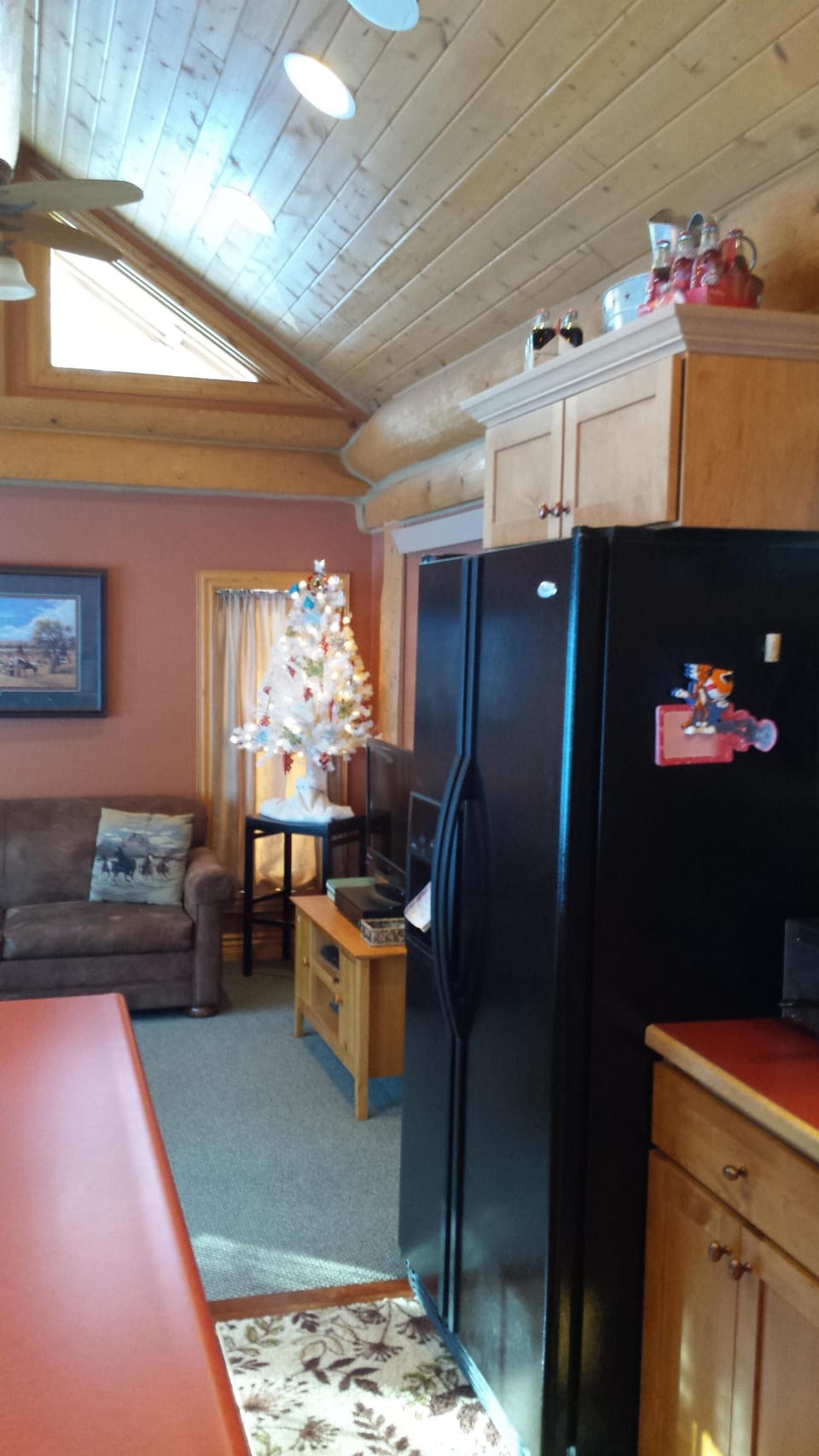 Full size side by side refrigerator/freezer.