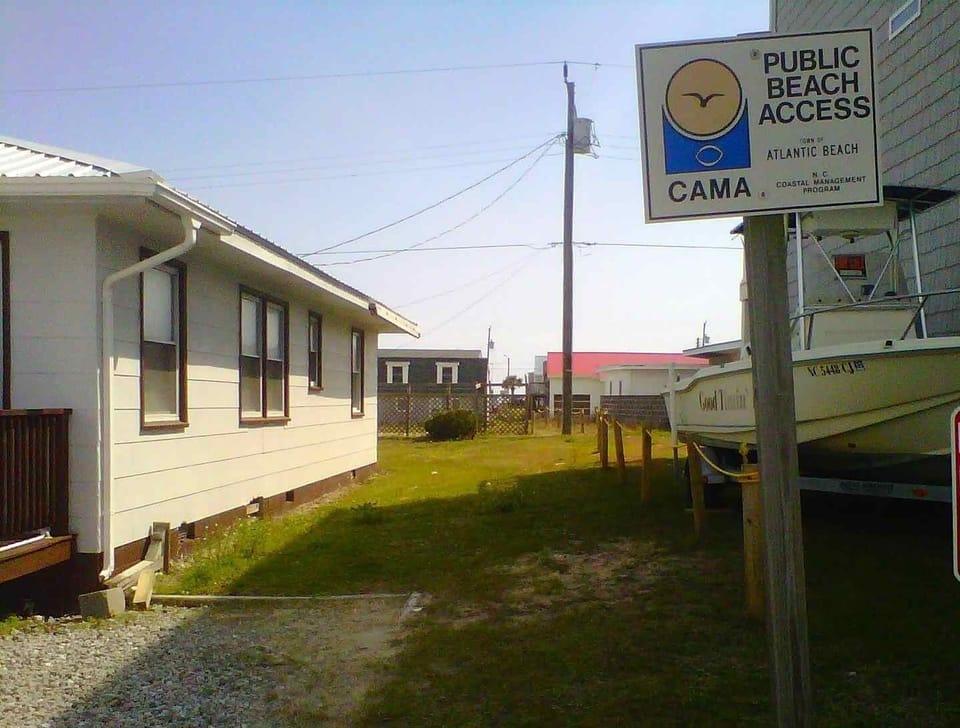 3 block walk to the beach beside the cottage, straight to ocean. 