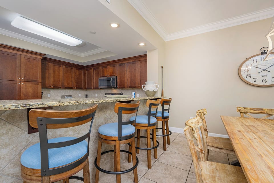Gather around the stylish bar seating and enjoy meals prepared in the spacious kitchen