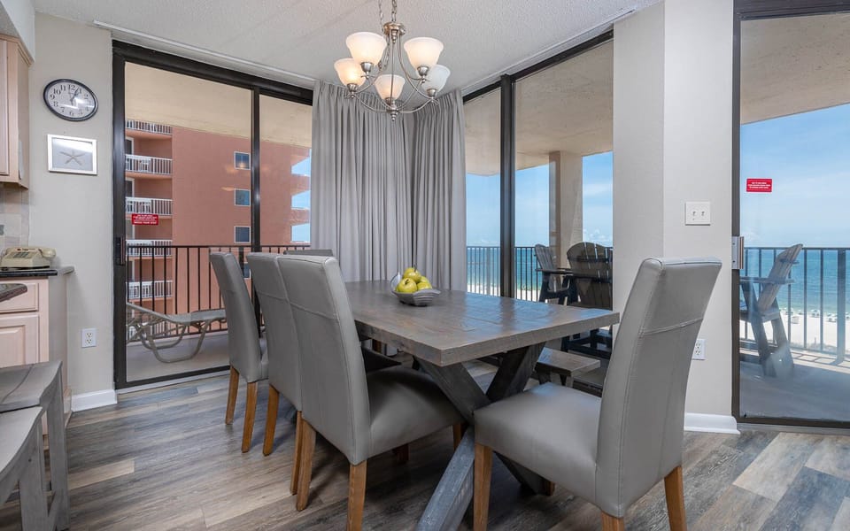 Dine with a beach view as you enjoy meals at the table, surrounded by natural light and coastal breezes