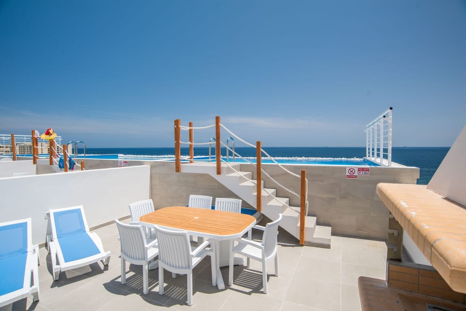 Outdoor Area; Table, Chairs and Sun Loungers 