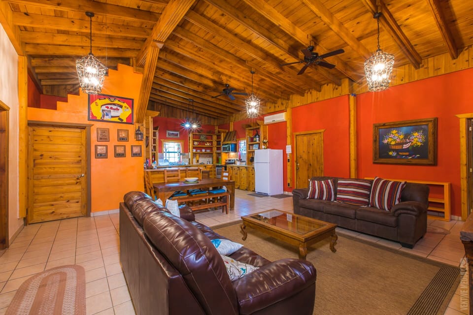 Open space living room-dining room and kitchen. Large pantry room