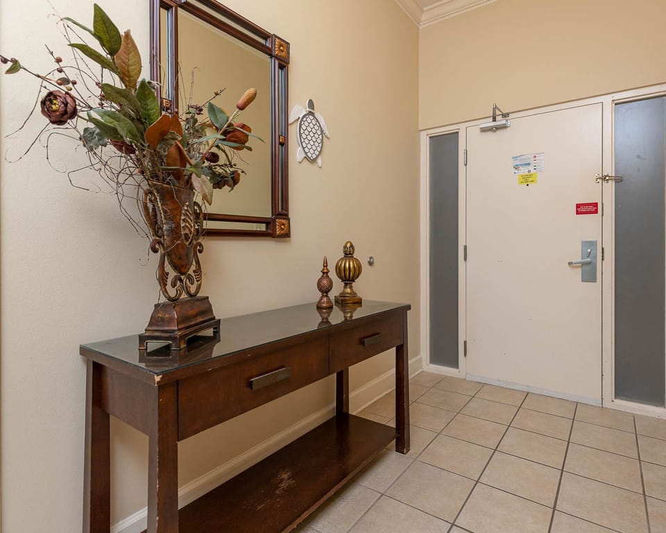 Welcome home as you step into this inviting entryway, adorned with elegant decor that sets the tone for your stay