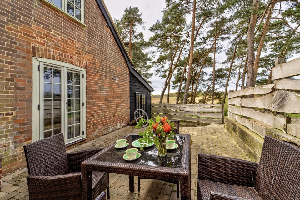 The Buttery, Freston: Enclosed courtyard with outdoor furniture