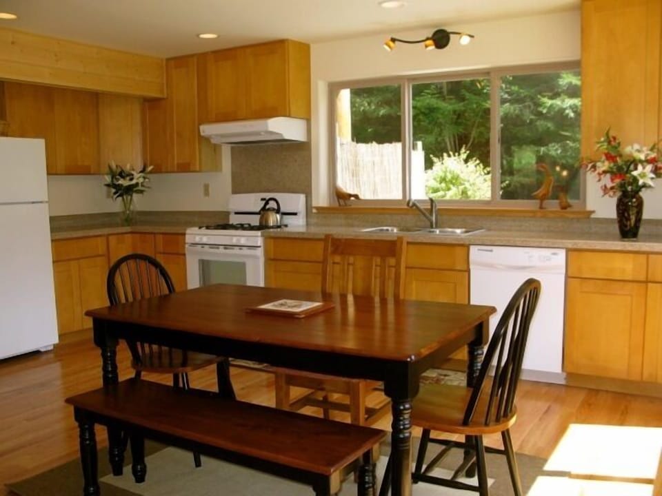 Kitchen with sunny dining 